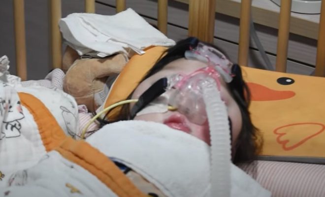 S'pore baby born with cerebral palsy sleeps with ventilator nightly, family needs help with bills