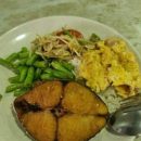 Customer pays S$14 for mixed vegetable rice including fish at Ang Mo Kio hawker centre