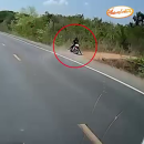 Driver in Thailand stops to help young child waving for help after mom had a motorcycle accident