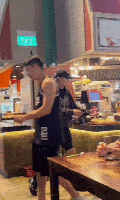 Jackson Wang dines at Lau Pa Sat, helps to return tray after meal