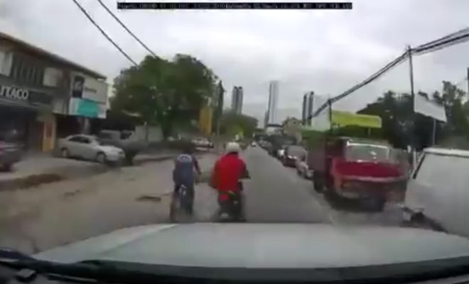 Motorcyclist kicks cyclist off M’sian road in video from 2023, police urge courtesy & tolerance