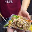 Street hawker in China cooks fried rice with ice cream, tops it off with rainbow sprinkles